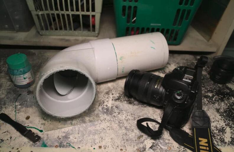 看摄影师 DIY “潜望镜”般水下摄影装置